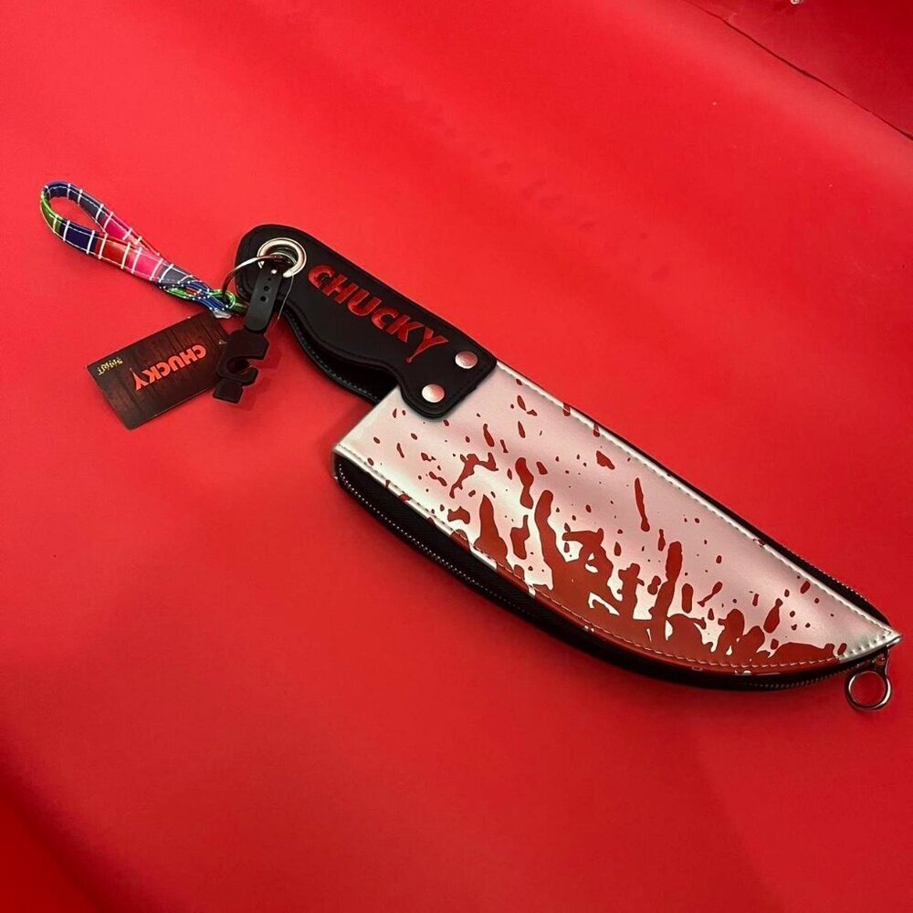 Spirit Halloween / Chucky themed knife, mini purse​​